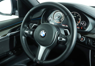 Подержанный автомобиль BMW X6 2014 года (15 фото)