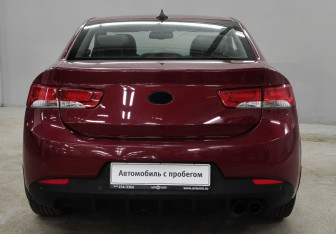 Подержанный автомобиль Kia Cerato Coupe 2011 года (7 фото)