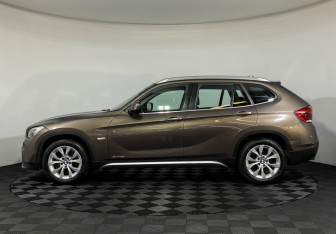 Подержанный автомобиль BMW X1 2011 года (5 фото)