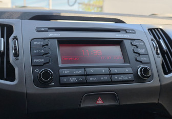 Подержанный автомобиль Kia Sportage 2014 года (13 фото)