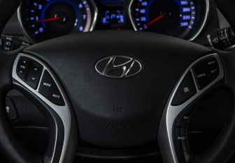 Подержанный автомобиль Hyundai Elantra Sedan 2011 года (11 фото)