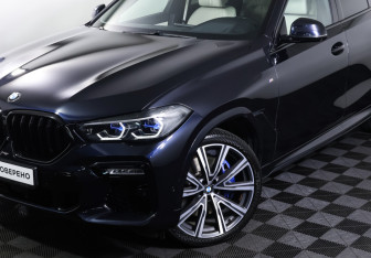 Подержанный автомобиль BMW X6 2021 года (26 фото)