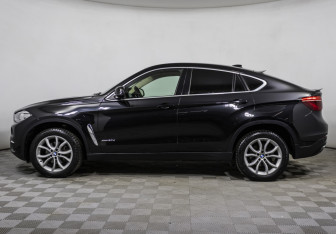 Подержанный автомобиль BMW X6 2015 года (8 фото)