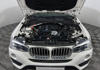 Подержанный автомобиль BMW X4 2015 года (10 фото)