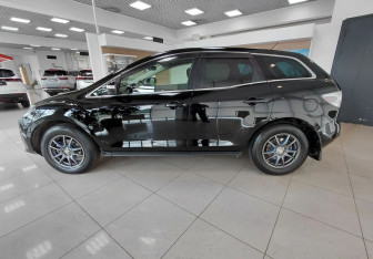 Подержанный автомобиль Mazda CX-7 2011 года (8 фото)