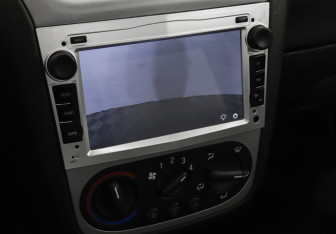 Подержанный автомобиль Opel Corsa 2006 года (13 фото)