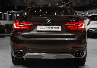 Подержанный автомобиль BMW X6 2016 года (5 фото)