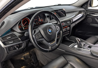 Подержанный автомобиль BMW X6 2016 года (15 фото)