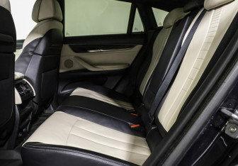 Подержанный автомобиль BMW X6 2015 года (15 фото)