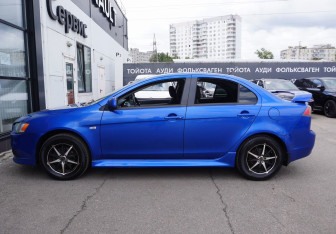 Подержанный автомобиль Mitsubishi Lancer Sedan 2011 года (8 фото)