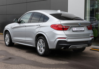 Подержанный автомобиль BMW X4 2016 года (7 фото)
