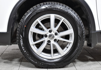 Подержанный автомобиль Nissan X-Trail 2018 года (9 фото)