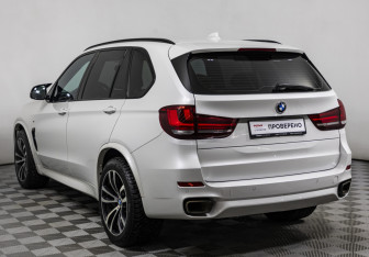Подержанный автомобиль BMW X5 2014 года (7 фото)