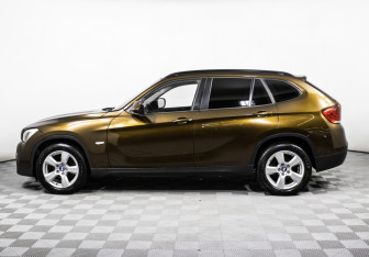 Подержанный автомобиль BMW X1 2011 года (8 фото)