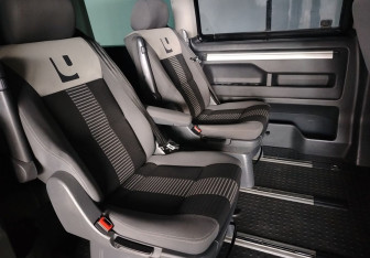 Подержанный автомобиль Volkswagen Multivan 2010 года (10 фото)