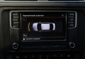 Подержанный автомобиль Volkswagen Jetta Sedan 2014 года (18 фото)
