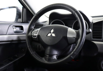 Подержанный автомобиль Mitsubishi Lancer Sedan 2013 года (12 фото)