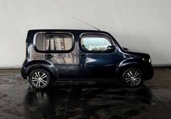 Подержанный автомобиль Nissan Cube 2010 года (9 фото)