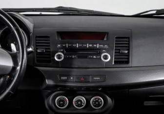 Подержанный автомобиль Mitsubishi Lancer Sedan 2008 года (13 фото)