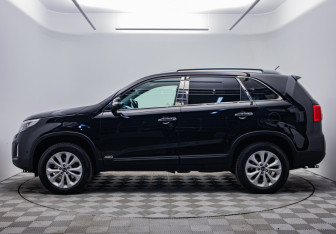 Подержанный автомобиль Kia Sorento 2015 года (2 фото)