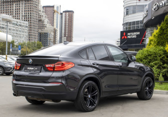 Подержанный автомобиль BMW X4 2017 года (4 фото)