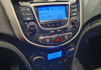 Подержанный автомобиль Hyundai Solaris Sedan 2012 года (12 фото)