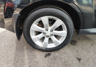 Подержанный автомобиль Mitsubishi Outlander 2011 года (12 фото)
