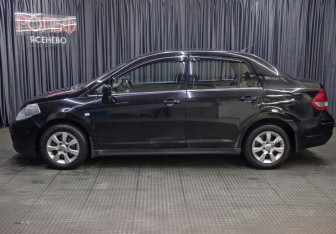 Подержанный автомобиль Nissan Tiida Sedan 2010 года (8 фото)