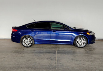 Подержанный автомобиль Ford Fusion (North America) 2015 года (8 фото)