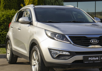 Подержанный автомобиль Kia Sportage 2012 года (19 фото)