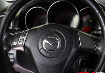 Подержанный автомобиль Mazda 3 Hatchback 2007 года (15 фото)