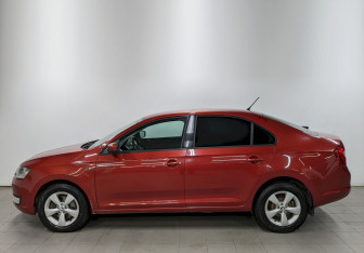 Подержанный автомобиль Skoda Rapid Liftback 2014 года (8 фото)