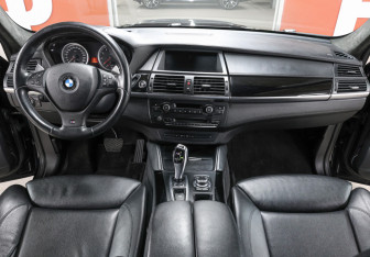 Подержанный автомобиль BMW X6 M 2013 года (15 фото)