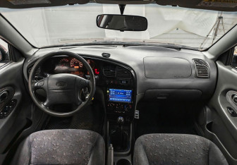 Подержанный автомобиль Kia Spectra Sedan 2007 года (11 фото)