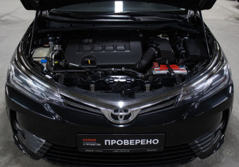 Подержанный автомобиль Toyota Corolla Sedan 2017 года (9 фото)