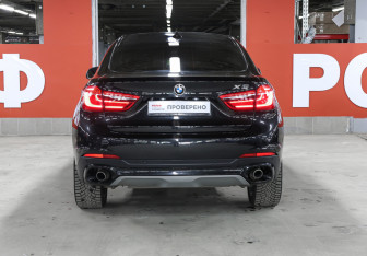 Подержанный автомобиль BMW X6 2015 года (6 фото)