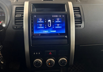 Подержанный автомобиль Nissan X-Trail 2010 года (13 фото)