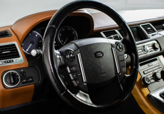 Подержанный автомобиль Land Rover Range Rover Sport 2012 года (14 фото)
