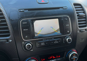 Подержанный автомобиль Kia Cerato Sedan 2014 года (12 фото)