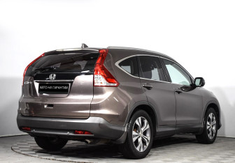 Подержанный автомобиль Honda CR-V 2013 года (3 фото)