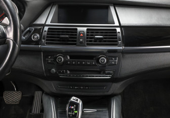 Подержанный автомобиль BMW X6 M 2013 года (16 фото)