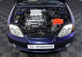 Подержанный автомобиль Hyundai Coupe 2002 года (9 фото)