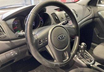 Подержанный автомобиль Kia Cerato Sedan 2012 года (12 фото)