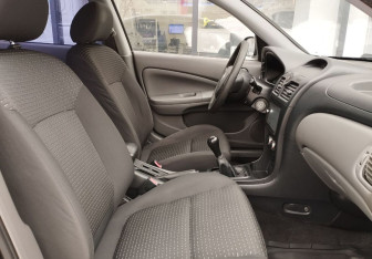 Подержанный автомобиль Nissan Almera Classic 2008 года (10 фото)