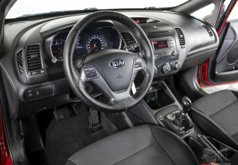 Подержанный автомобиль Kia Cerato Sedan 2013 года (9 фото)