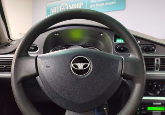 Подержанный автомобиль Daewoo Nexia Sedan 2012 года (15 фото)