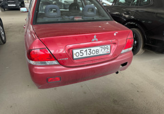 Подержанный автомобиль Mitsubishi Lancer Sedan 2007 года (7 фото)