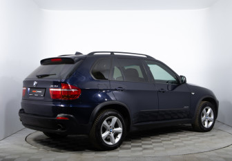Подержанный автомобиль BMW X5 2010 года (5 фото)