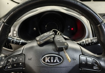 Подержанный автомобиль Kia Sportage 2012 года (18 фото)