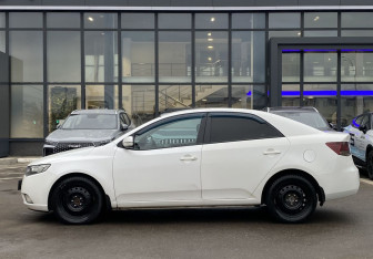 Подержанный автомобиль Kia Cerato Sedan 2012 года (8 фото)